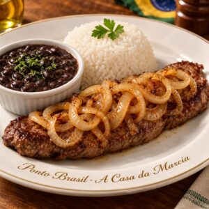 Bife acebolado brasileño en Lima — filete de res jugoso con cebolla caramelizada, arroz y frejol negro.